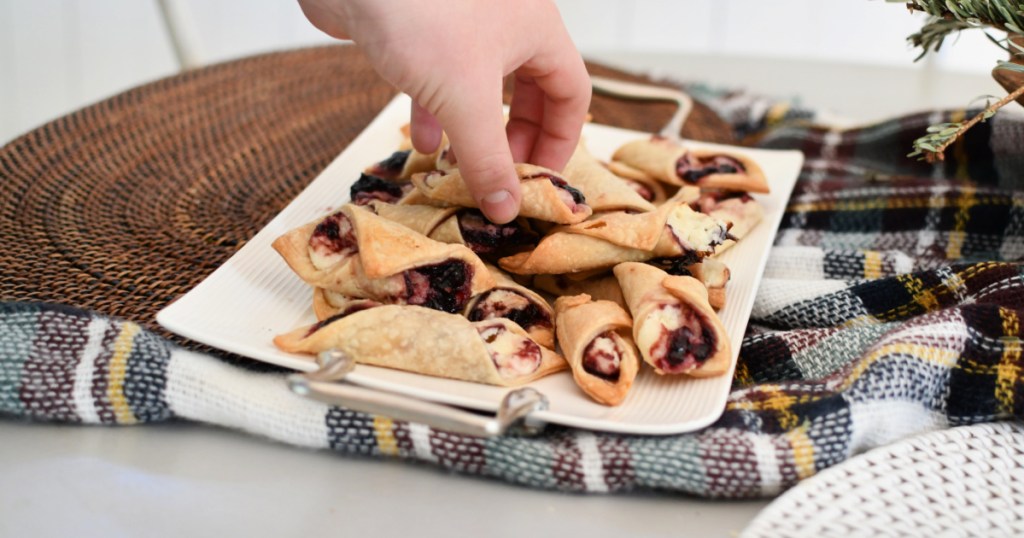 grabbing a blackberry tart