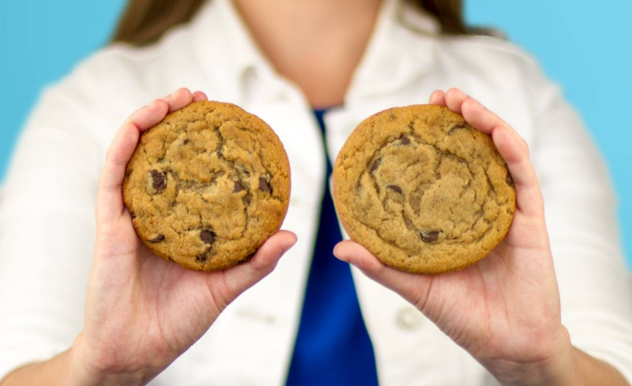 holding Great American cookies 