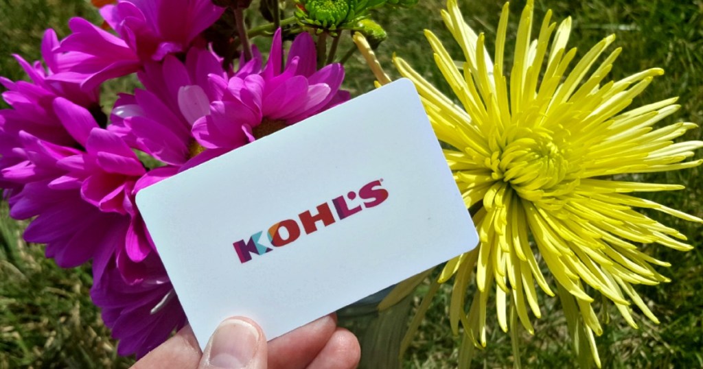 hand holding a kohl's gift card