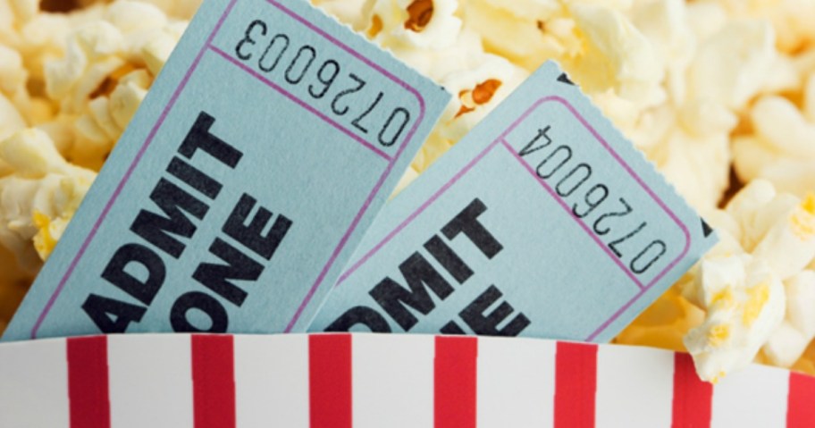 Movie Tickets in a bucket of popcorn
