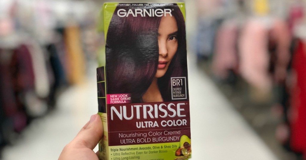 hand holding box of hair color