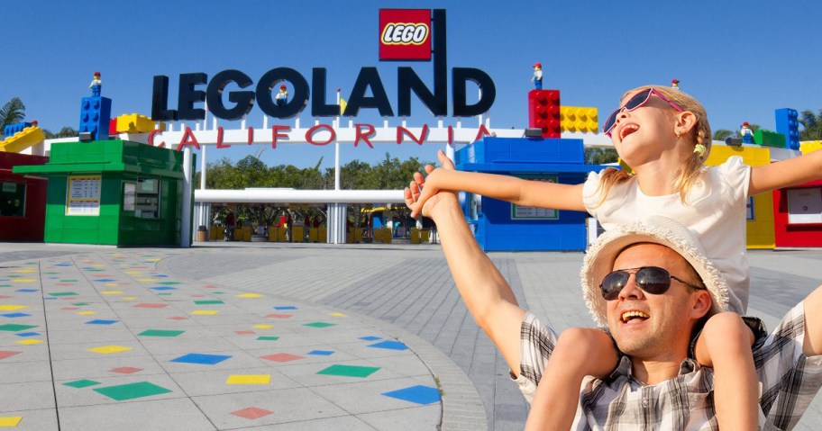 kid and their parent in front of LEGO Land cali 