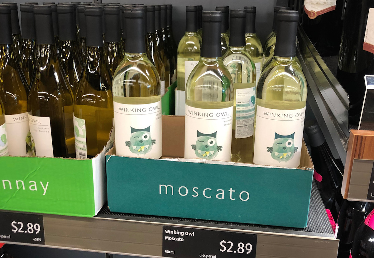 bottles of winking owl moscato on shelf at aldi