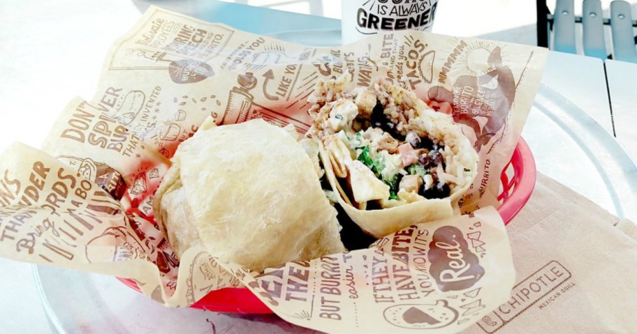 mexican burrito wrap sitting in fast food basket