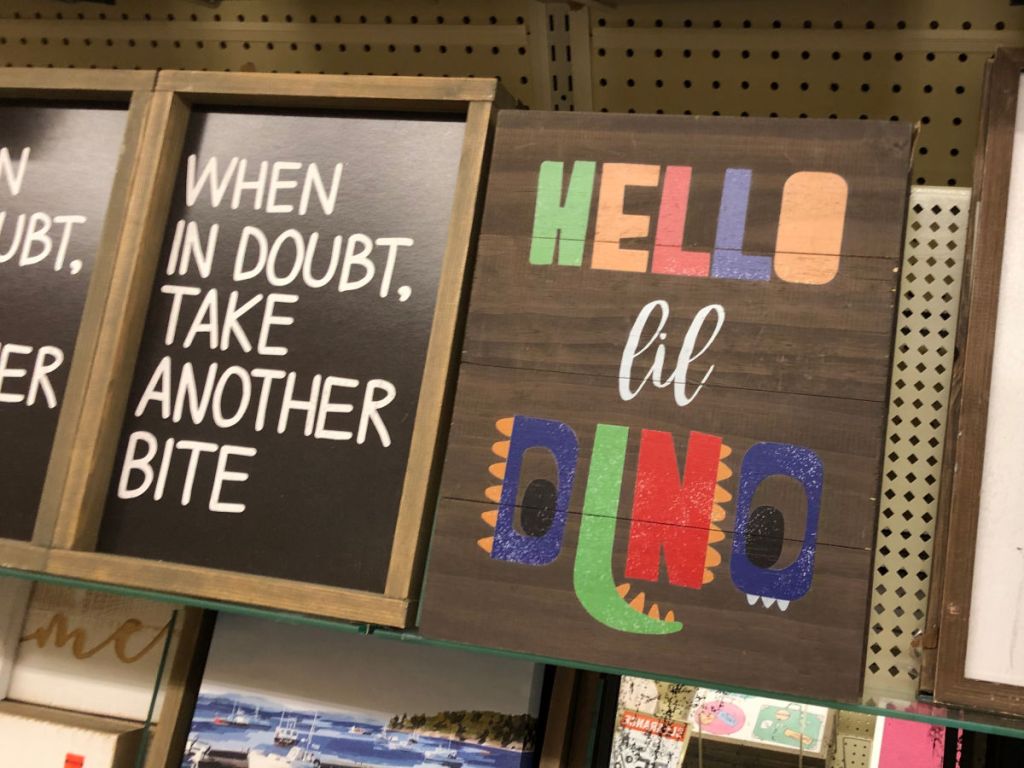 Hello Lil Dino Sign and When in doubt, take another bite sign at Hobby Lobby