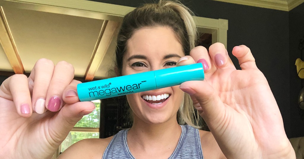 emily holding up wet n wild mascara