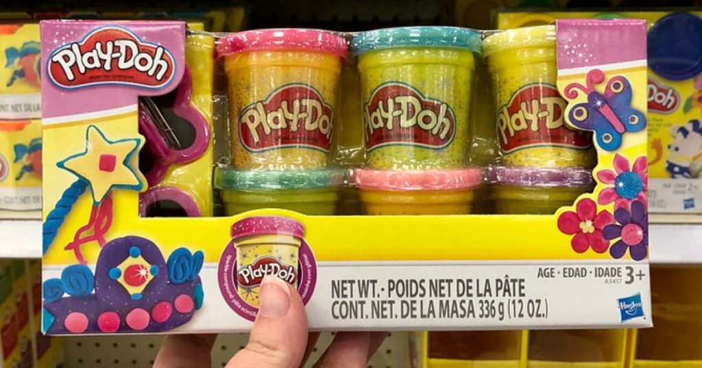 lady holding Playdoh sparkling compound