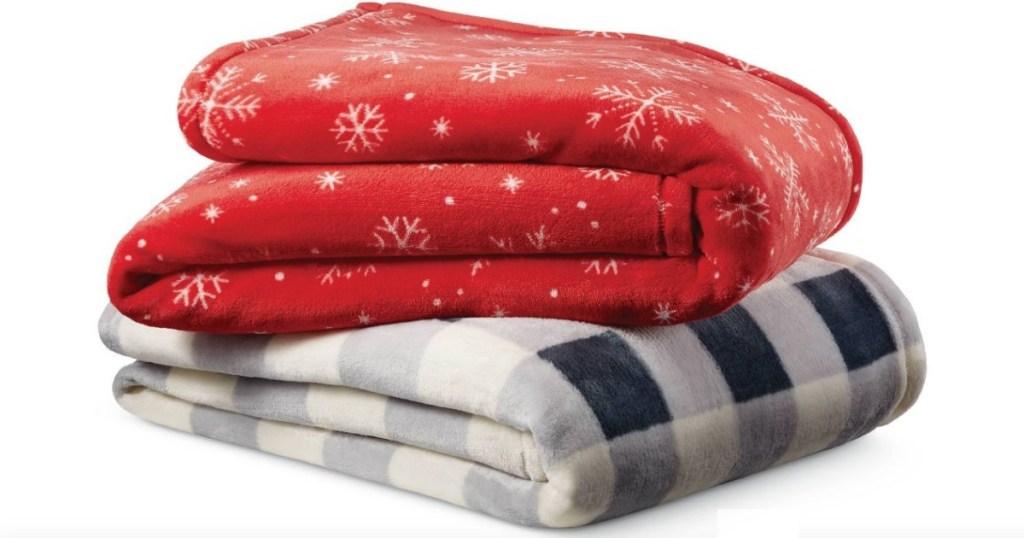 Stack of Wondershop Printed Plush Throw Blankets