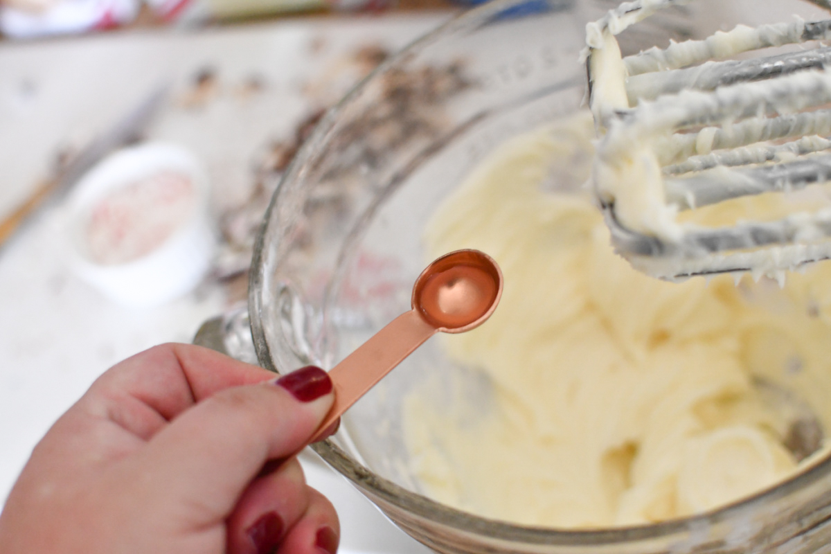 pouring ingredients into mix