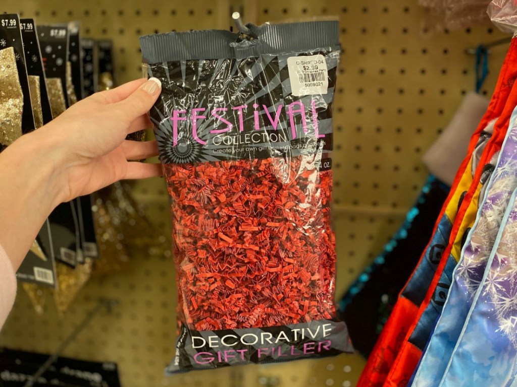 bag of red gift filler in package