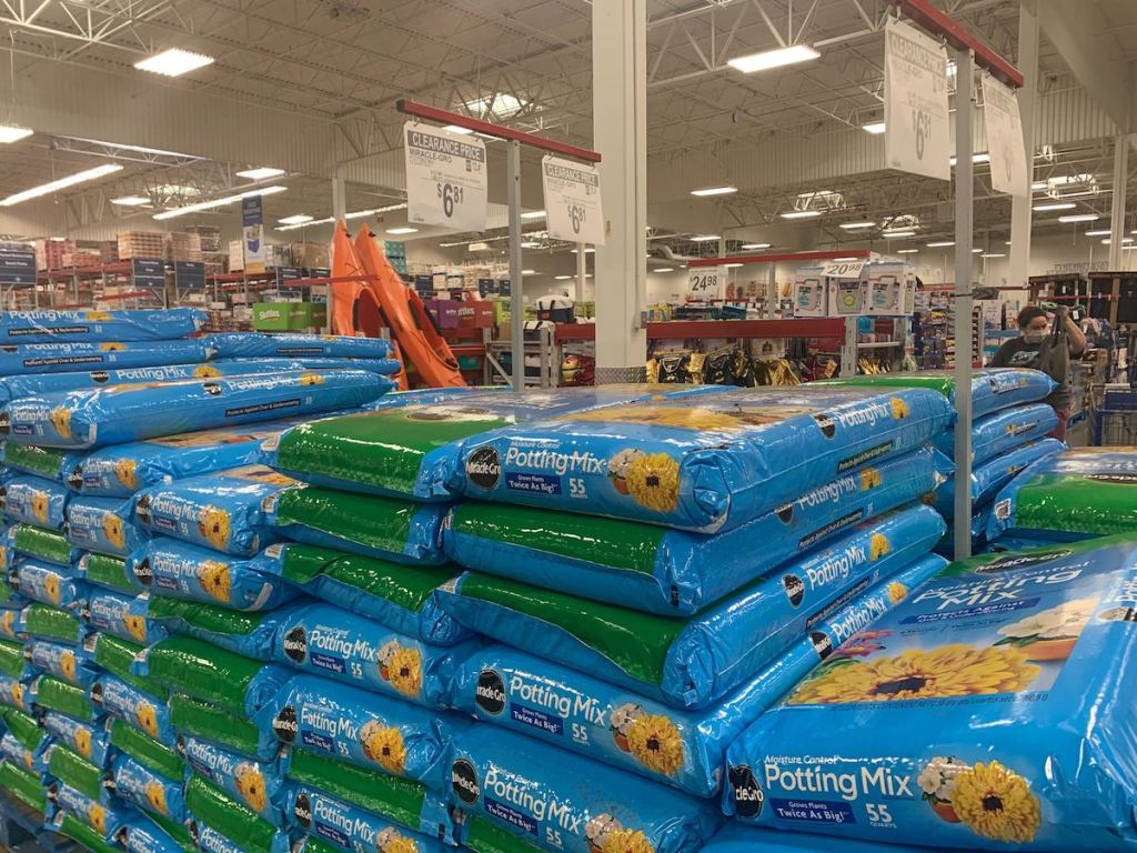 pile of Miracle Gro Potting Mix at Sams Club 
