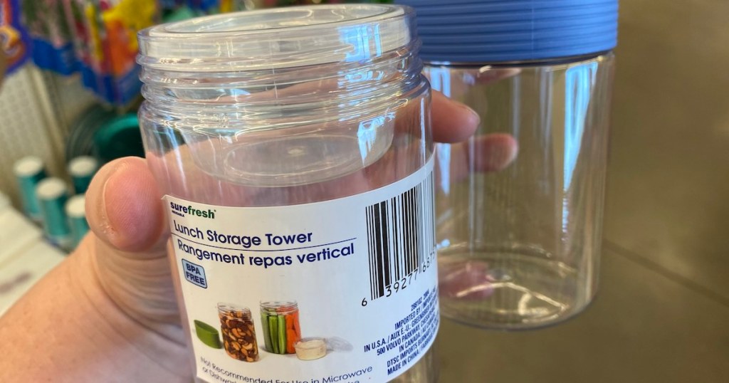 hand holding Sure Fresh Lunch Storage Tower separated 