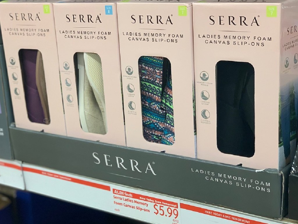 boxes of shoes on display at store
