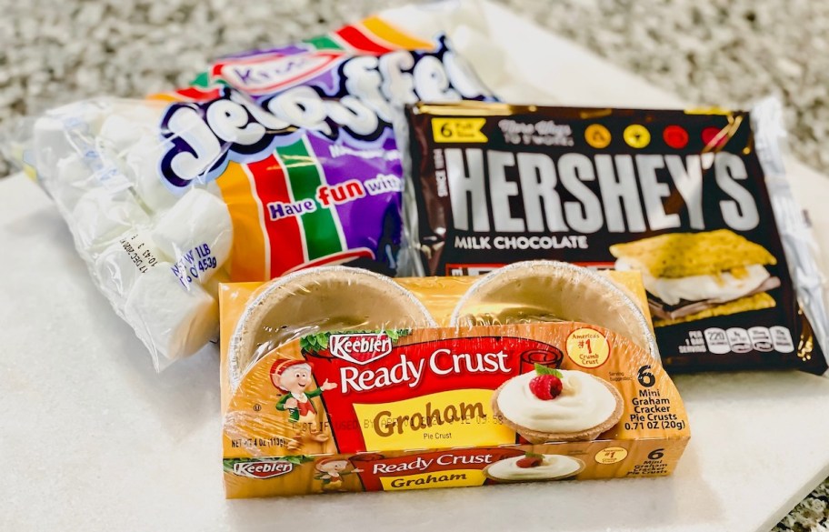 mini pie crusts in packaging with hersheys chocolate bars and marshmallows