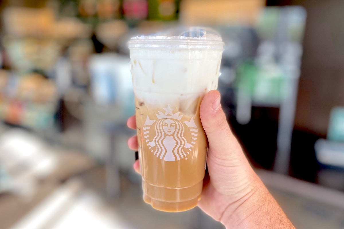 hand holding starbucks secret menu salted caramel drink