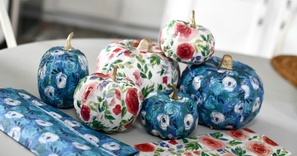 tissue paper mod podge pumpkins on a table