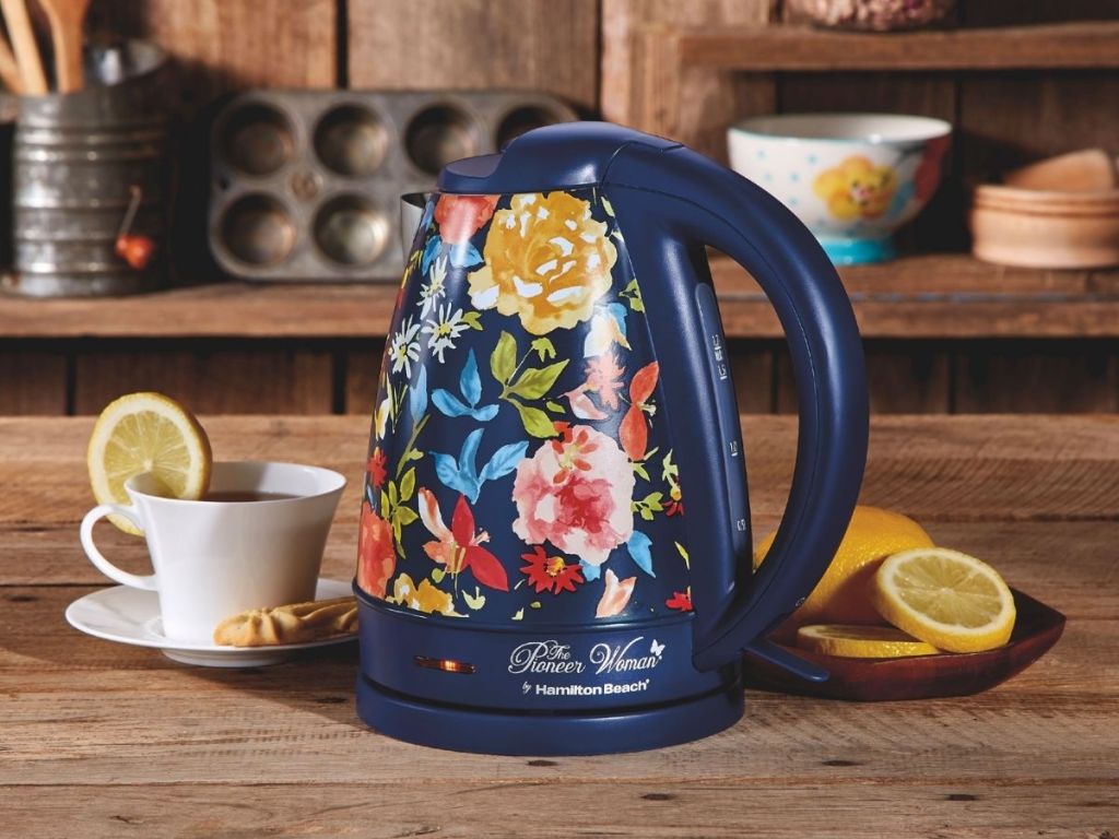 blue pioneer woman electric kettle on counter next to tea