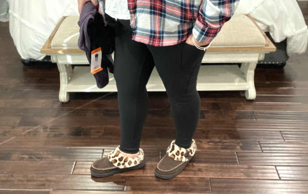 woman wearing black lululemon leggings dupes with leopard slippers