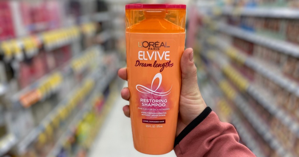 l'oreal elvive shampoo in hand in store at walgreens