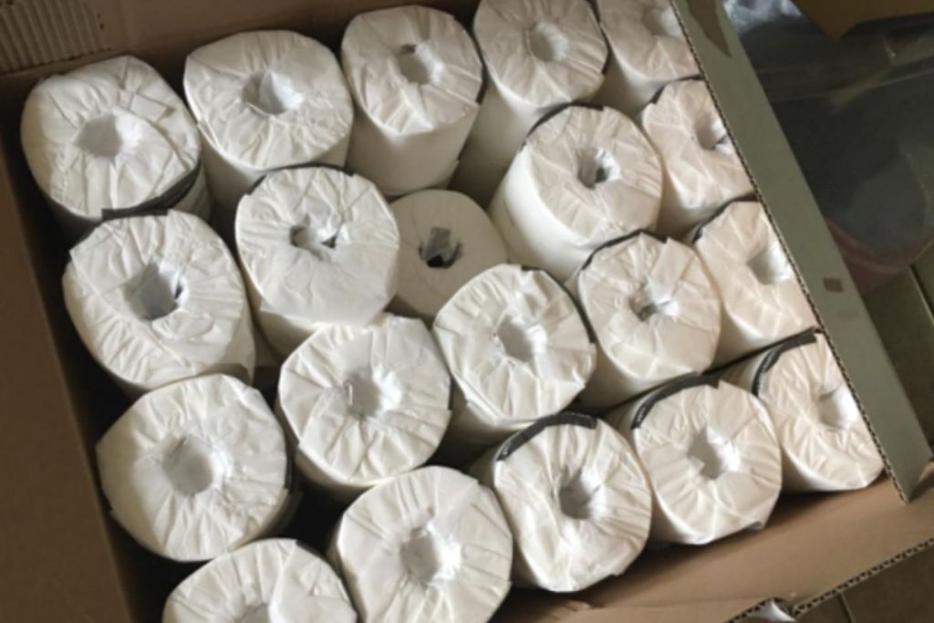 A box of bulk bath tissue