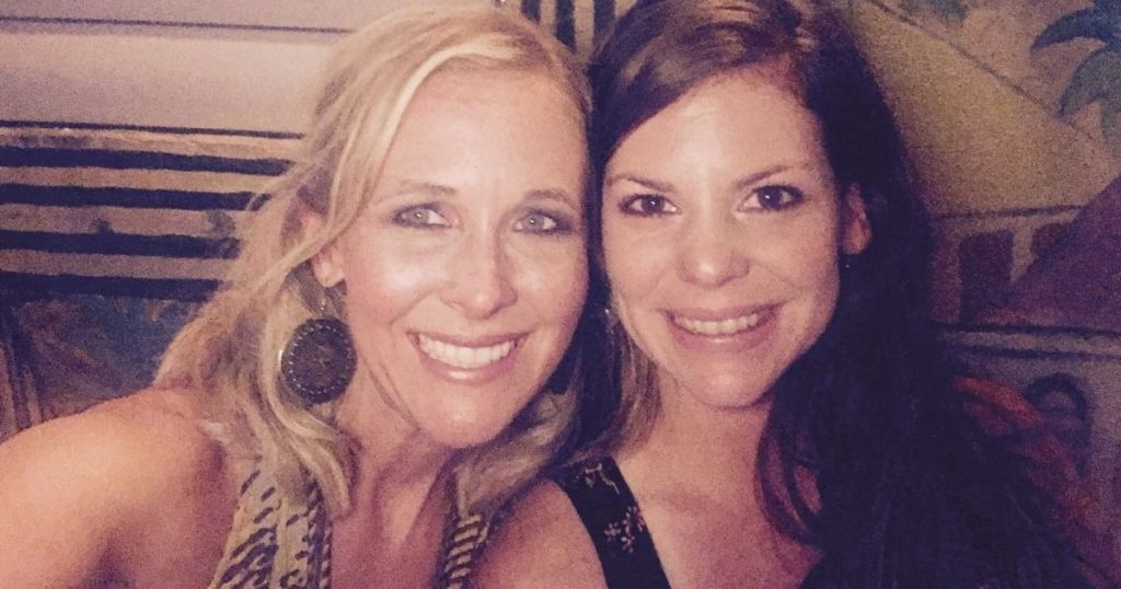 Two women smiling