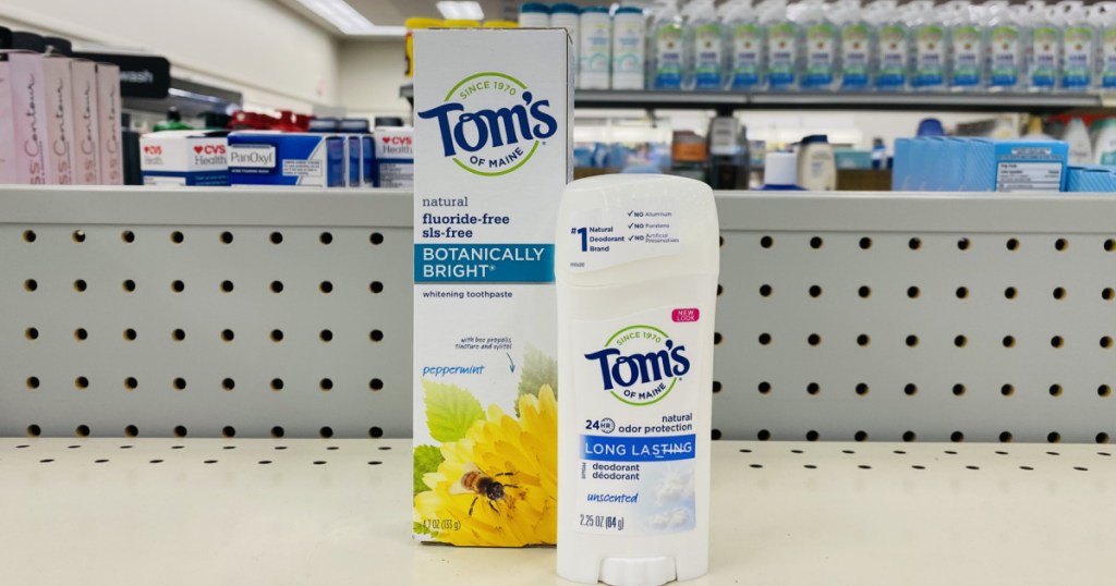 white box of toothpaste and deodorant 