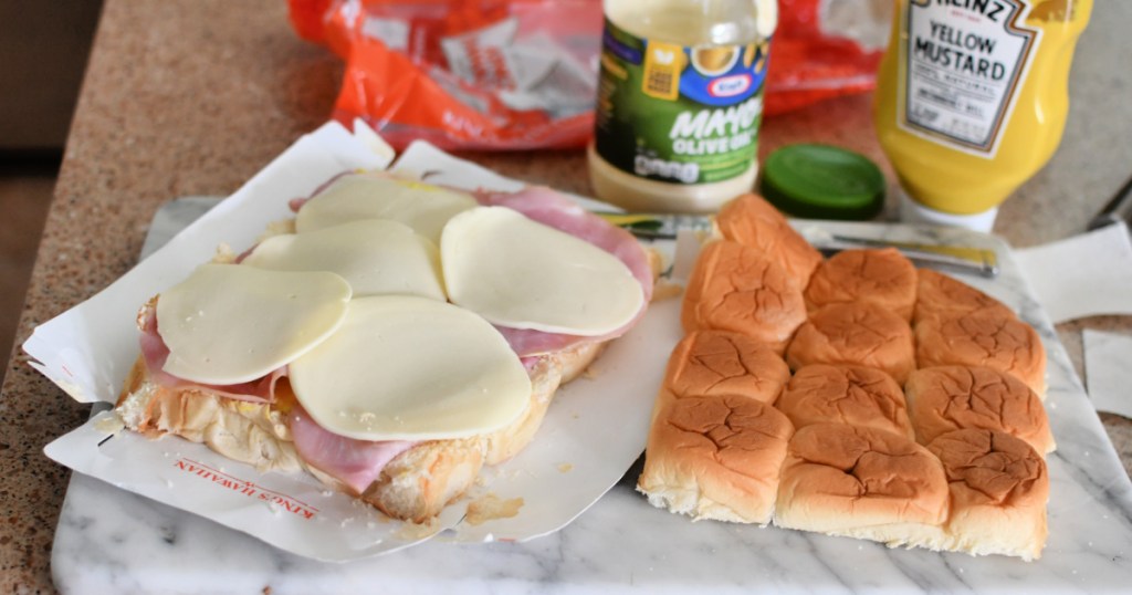making mini sandwiches using hawaiian rolls