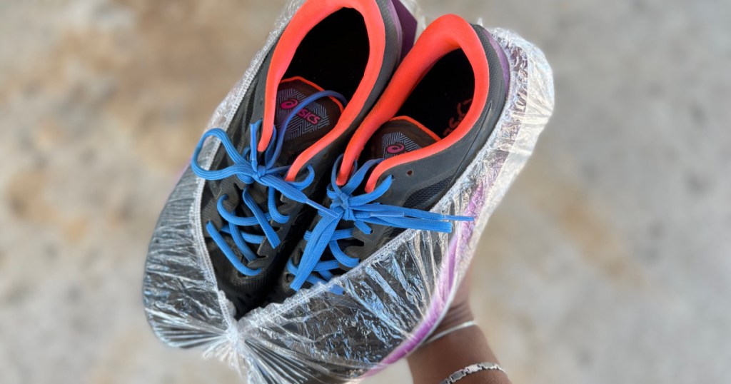 sneakers in shower cap