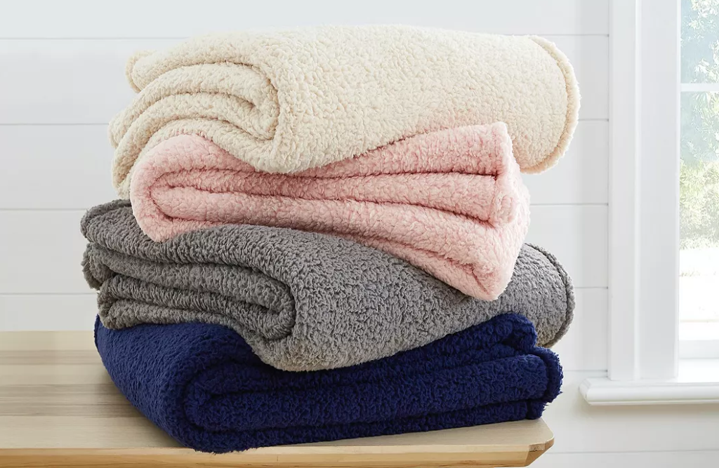 stack of folded blankets