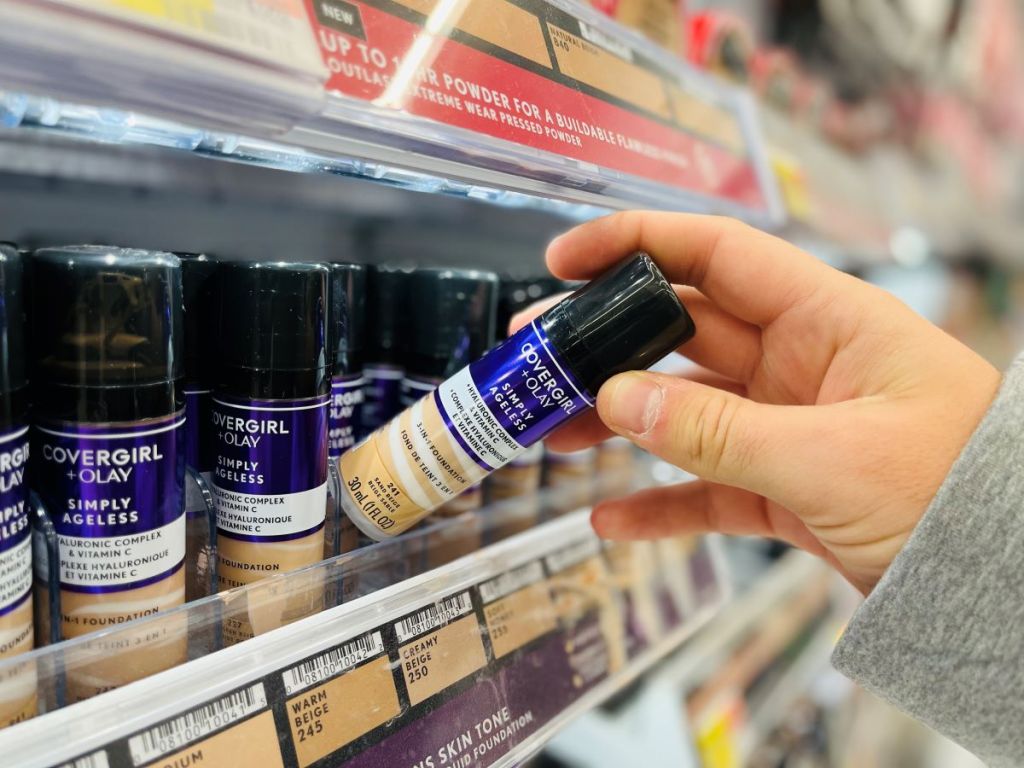 hand holding a COVERGIRL foundation