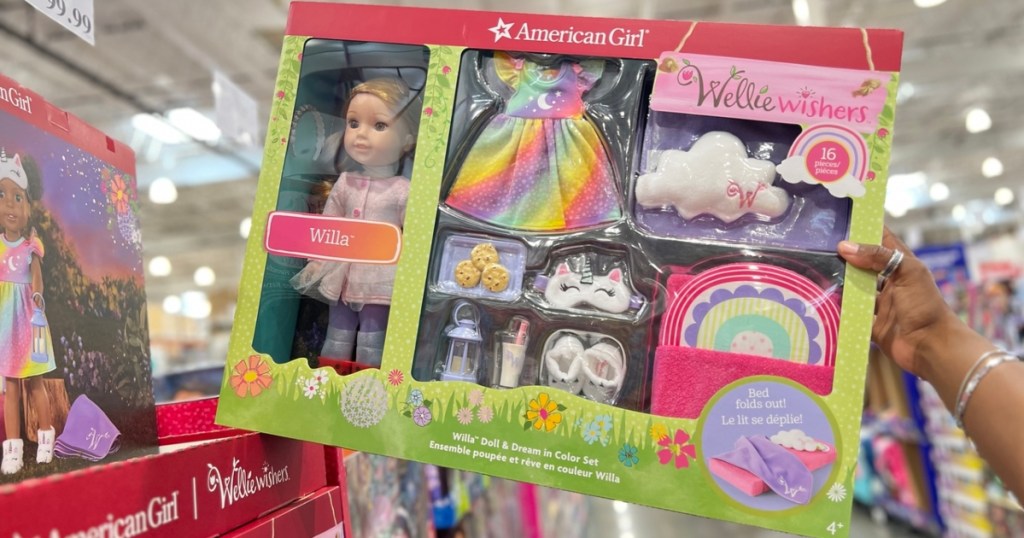 holding a Wellie Wisher gift set