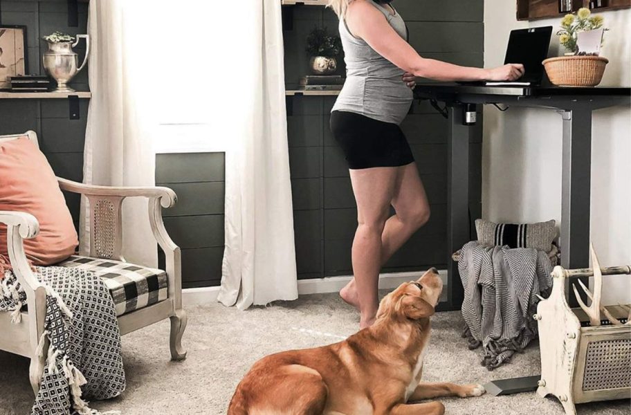 woman working at flexispot standing desk