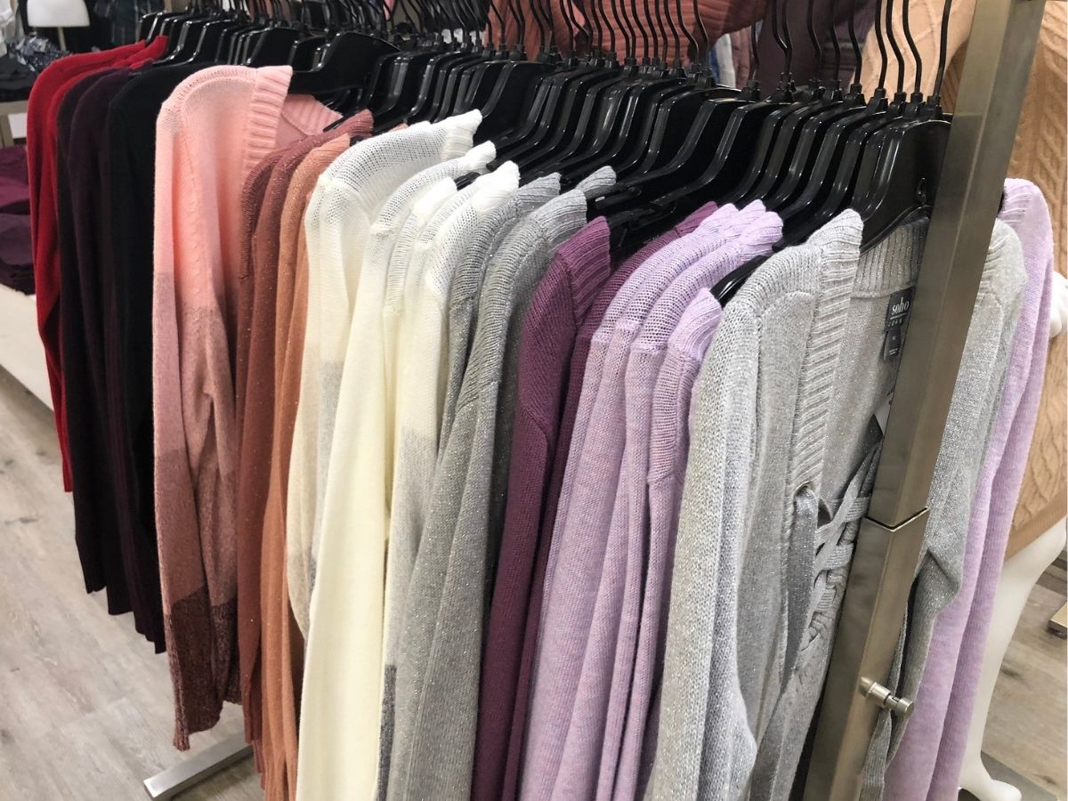 rack of women's cardigans