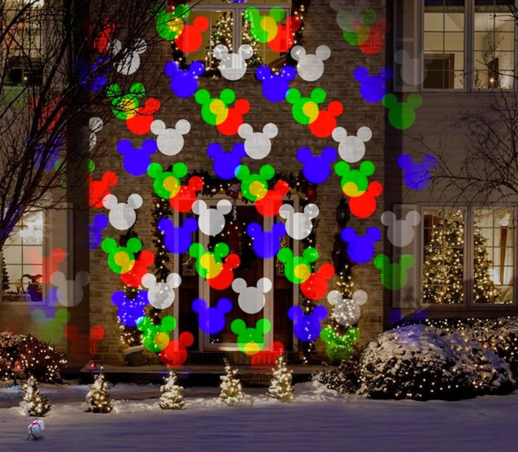 disney projector shining on house