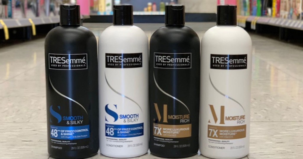 black and white shampoo bottles on floor 