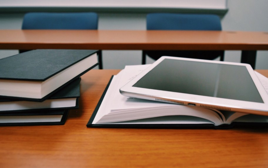 college classroom with books open on a table