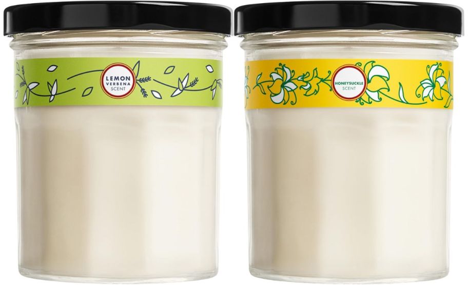 two mrs meyers soy candles in lemon verbena and honeysuckle scents