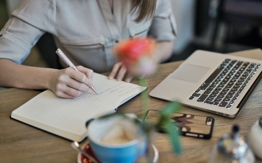 woman taking notes