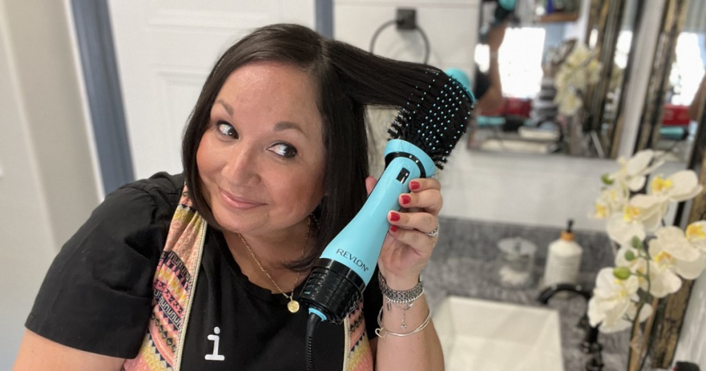 woman using revlon dryer brush 2.0