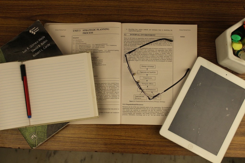 college textbooks on desk