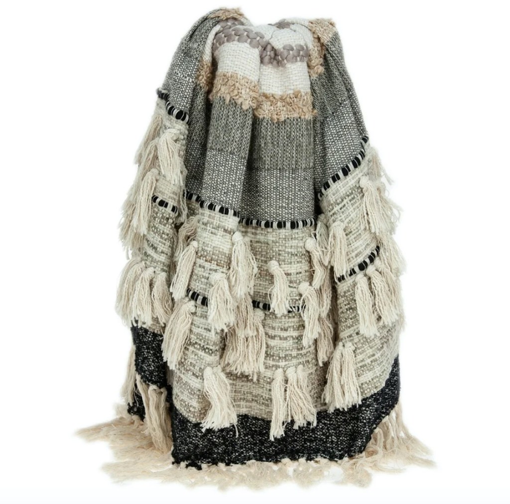 stock photo of boho neutral colored blanket