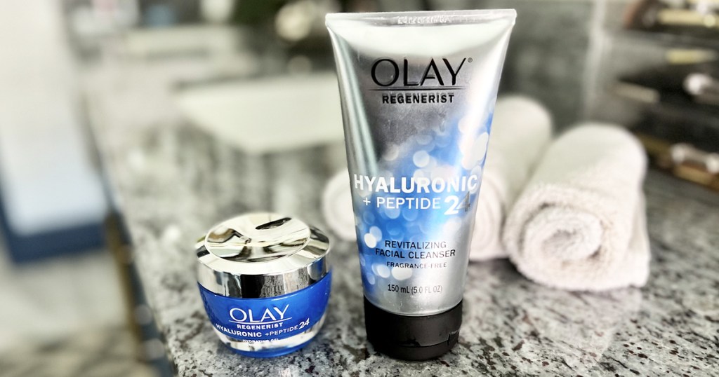 olay cleanser and moisturizer on bathroom counter