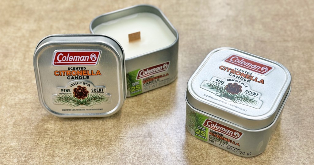two Coleman Citronella Candles on table