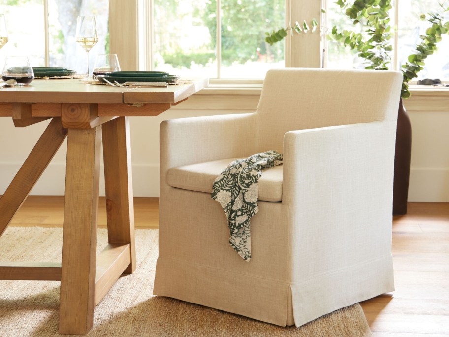 white chair next to wooden table