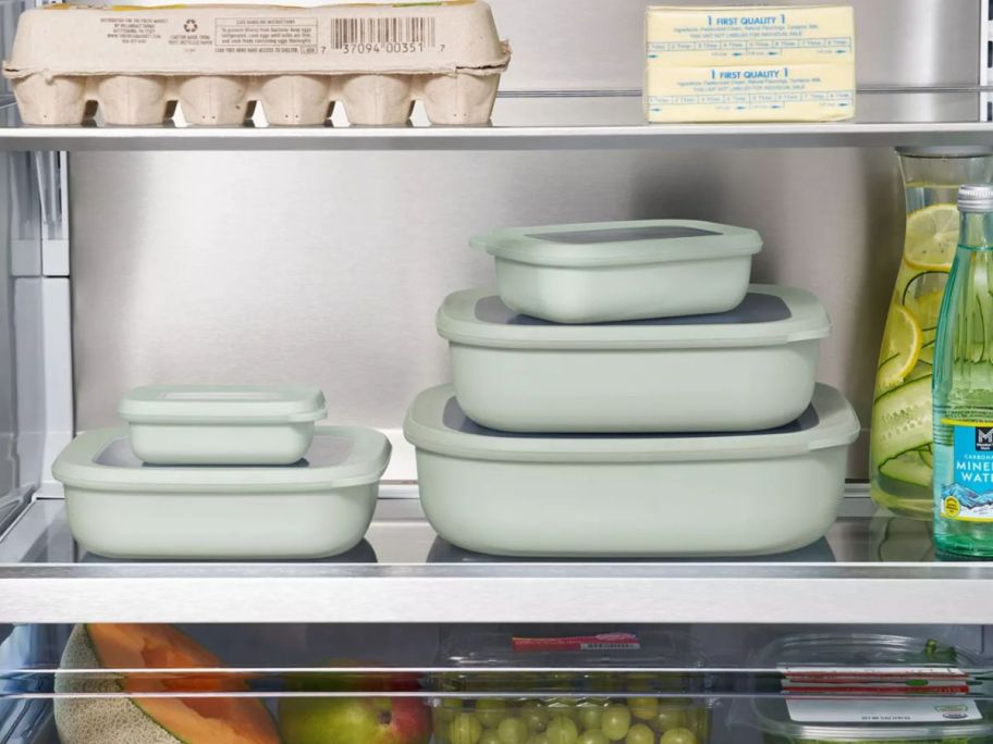 member's mark food storage container set stacked on top of each other in refrigerator