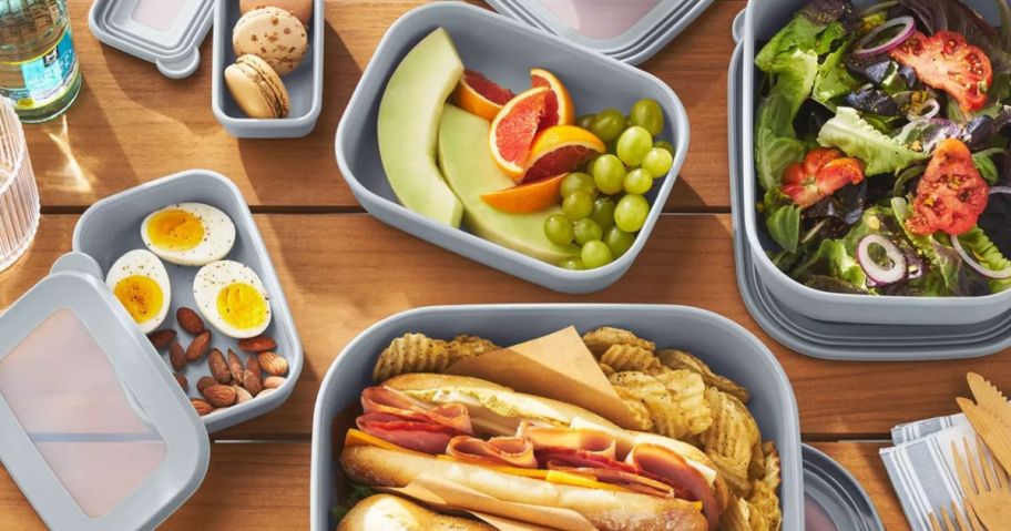 member's mark food storage container set on table filled with food