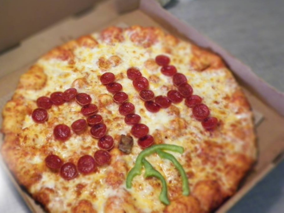 pepperoni in the shape of 3.14 on a pizza