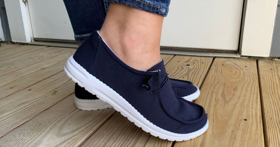 side view of woman's feet wearing 32 Degrees Slip On Shoes