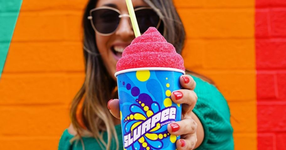 Woman holding a slurpee