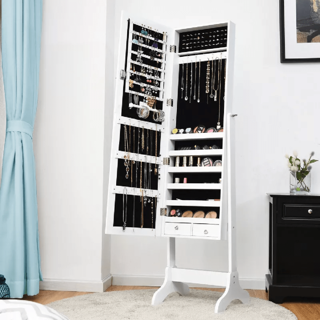 A white full length mirror that doubles as a jewelry organizer and holder